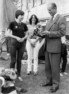 The Duke of Edinburgh. Patricia Woods is gives a toy Tiger Prince Philip The Duke of Edinburgh. Patricia Woods is gives a toy Tiger Prince Philip
