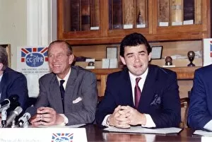 Images Dated 11th December 1991: The Duke of Edinburgh, Prince Philip and rugby player Will Carling attend the press