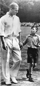 The Duke of Edinburgh. Prince Philip with an unknown child. 1950's The Duke of Edinburgh. Prince Philip with an unknown child. 1950's