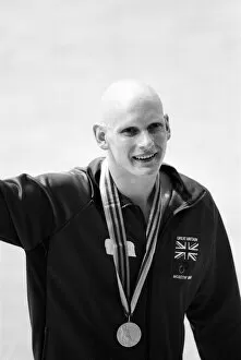 Images Dated 22nd July 1980: Duncan Goodhew swimmer takes part in medal ceremony after winning gold medal in Men