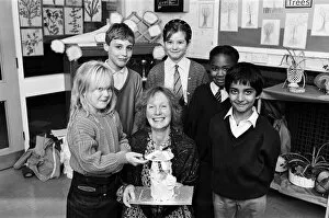 Images Dated 7th November 1989: Dustbin delight, Mrs Margaret Sutcliffe, of Marsh, presents one of the dustbin-shaped