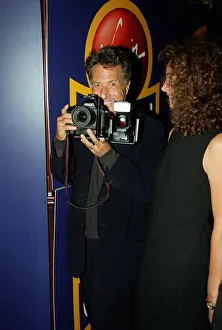 Dustin Hoffman Actor August 98 Holding a camera at the premiere of Lock Stock And Dustin Hoffman Actor August 98 Holding a camera at the premiere of Lock Stock And