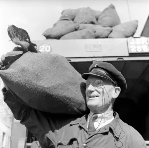 Dustman wears a monocle. August 1953 D5255-001 Dustman wears a monocle. August 1953 D5255-001