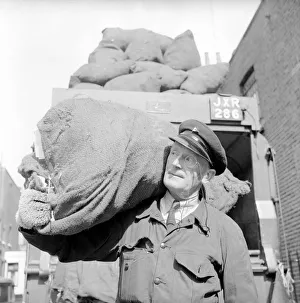 Dustman wears a monocle. August 1953 D5255-002 Dustman wears a monocle. August 1953 D5255-002
