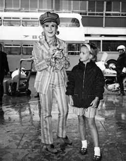 Dusty Springfield pictured at London Heathrow airport signing an autograph for a young Dusty Springfield pictured at London Heathrow airport signing an autograph for a young