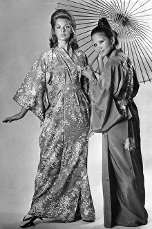 East meets West under a traditional oiled paper umbrella East meets West under a traditional oiled paper umbrella