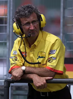 Eddie Jordan Team Manager watches Warm Up Session at Sliverstone 1999 before the British Eddie Jordan Team Manager watches Warm Up Session at Sliverstone 1999 before the British