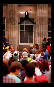 Edinburgh Festival August 1998 man performer climbing up between two pillars Edinburgh Festival August 1998 man performer climbing up between two pillars