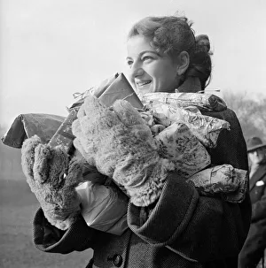 Edna Colyer ready too hand out Christmas Presents to the Hearne Hill Harriers after a Edna Colyer ready too hand out Christmas Presents to the Hearne Hill Harriers after a