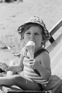 Eighteen month old Nicola England from Bromley, Kent enjoys an ice cream on the beach at Eighteen month old Nicola England from Bromley, Kent enjoys an ice cream on the beach at