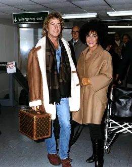 Elizabeth Taylor actress with her husband Larry Fortensky arriving at Heathrow airport Elizabeth Taylor actress with her husband Larry Fortensky arriving at Heathrow airport