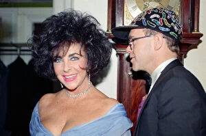 Images Dated 6th November 1991: Elizabeth Taylor and Elton John at a gala dinner in aid of the AIDS Crisis Trust in