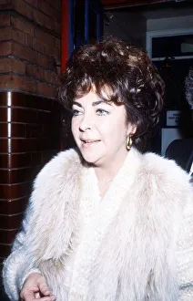 Elizabeth Taylor Feb 1982 wearing White Fur coat Dame Elizabeth Taylor Feb 1982 wearing White Fur coat Dame