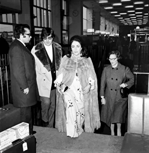Elizabeth Taylor with Henry Wynberg seen here arriving at Heathrow Airport Elizabeth Taylor with Henry Wynberg seen here arriving at Heathrow Airport