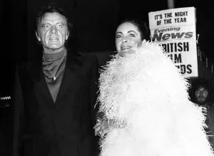 Elizabeth Taylor and Richard Burton arrive at the Evening News Briitish Film Awards in Elizabeth Taylor and Richard Burton arrive at the Evening News Briitish Film Awards in