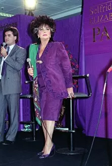 Images Dated 12th October 1989: Elizabeth Taylor at Selfridges London October 1986 to promote her perfume Passsion