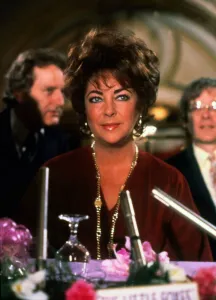 Elizabeth Taylor sitting at table February 1982 Elizabeth Taylor sitting at table February 1982