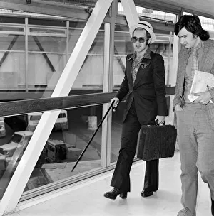 Elton John arrives at Heathrow airport from Arizona where he has been on holiday Elton John arrives at Heathrow airport from Arizona where he has been on holiday