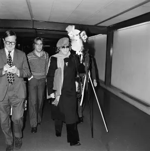 Elton John arriving at Heathrow Airport from Stockholm. 20th October 1977 Elton John arriving at Heathrow Airport from Stockholm. 20th October 1977