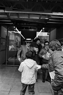 Elton John leaving the TV-am studios. 4th April 1983 Elton John leaving the TV-am studios. 4th April 1983