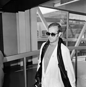 Images Dated 16th September 1979: Elton John at London Heathrow Airport. 16th September 1979