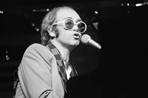Images Dated 2nd May 1977: Elton John performing on stage, during the Elton John and Ray Cooper concert tours