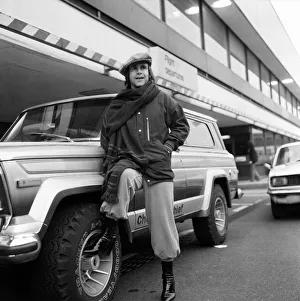 Elton John pictured next to an American Jeep at London Airport. February 1979 Elton John pictured next to an American Jeep at London Airport. February 1979