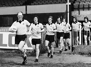 Images Dated 1st April 1974: Elton John superstar leading Watford FC out for training at Vicarage Road