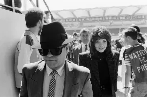Elton John and his wife Renate arriving to watch his team, Watford, play a football match Elton John and his wife Renate arriving to watch his team, Watford, play a football match