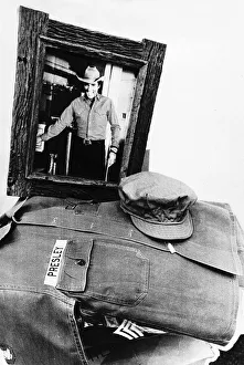 Elvis Presley's neatly folded army uniform Elvis Presley's neatly folded army uniform