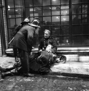 Emergency Services: Five service fireman R. Dastnell is revived by colleagues after fumes Emergency Services: Five service fireman R. Dastnell is revived by colleagues after fumes