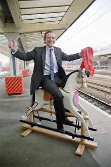 Employment Secretary, Norman Fowler, on a rocking horse Employment Secretary, Norman Fowler, on a rocking horse