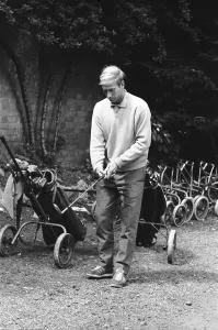 England footballer Bobby Charlton chosses his club as enjoys a round of golf during an England footballer Bobby Charlton chosses his club as enjoys a round of golf during an