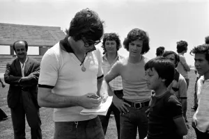 England footballer Malcolm MacDonald signs autographs for young fans in training before England footballer Malcolm MacDonald signs autographs for young fans in training before