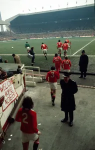 English FA Cup match at Old Trafford The United team walk onto the pitch at Old English FA Cup match at Old Trafford The United team walk onto the pitch at Old