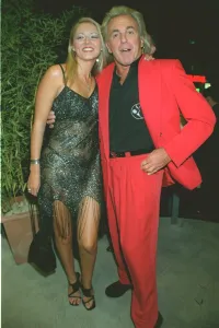 English Nightclub owner Peter Stringfellow with Claire Leng at the new Home nightclub in English Nightclub owner Peter Stringfellow with Claire Leng at the new Home nightclub in
