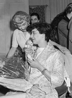 English playwright Shelagh Delaney receives a bouquet of flowers on the first night of English playwright Shelagh Delaney receives a bouquet of flowers on the first night of