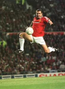 Eric Cantona jumping to control a ball Aug 1998 Eric Cantona jumping to control a ball Aug 1998