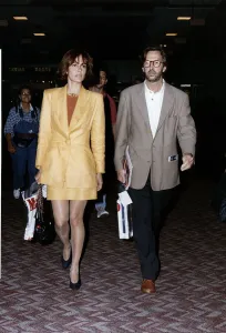 Eric clapton musician with un-named friend Eric clapton musician with un-named friend