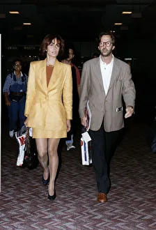 Eric clapton musician with un-named friend Eric clapton musician with un-named friend