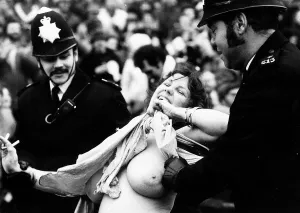 Erica Roe Streaker at International Rugby game at Twickenham, escorted by police Erica Roe Streaker at International Rugby game at Twickenham, escorted by police