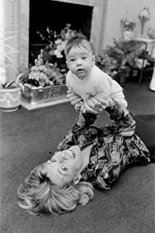 Esther Rantzen at home with her baby daughter Emily. 15th May 1978 Esther Rantzen at home with her baby daughter Emily. 15th May 1978