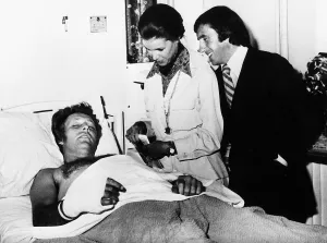 Evel Knievel American stuntman daredevil in hospital 1975 visited by Scottish Evel Knievel American stuntman daredevil in hospital 1975 visited by Scottish