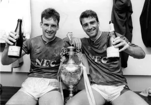 Everton captain Kevin Ratcliffe (right) and team mate Dave Watson celebrate with a glass Everton captain Kevin Ratcliffe (right) and team mate Dave Watson celebrate with a glass