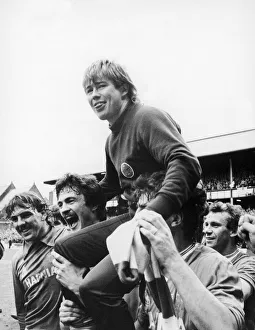 Everton footballer Adrian Heath sits on the shouders of jubilant teammates Derek Everton footballer Adrian Heath sits on the shouders of jubilant teammates Derek