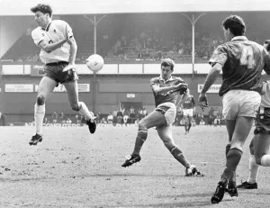 Everton footballer Kevin Sheedy chas a shot at goal blocked by Chelsea defenders during Everton footballer Kevin Sheedy chas a shot at goal blocked by Chelsea defenders during