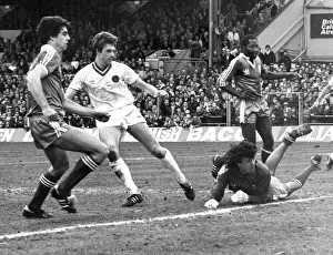 Everton footballer Kevin Sheedy score past Brighton goalkeeper Graham Mosely to give his Everton footballer Kevin Sheedy score past Brighton goalkeeper Graham Mosely to give his