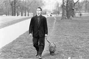 Not an everyday sight. A man walks his pig in Hyde Park. 17th March 1987 Not an everyday sight. A man walks his pig in Hyde Park. 17th March 1987