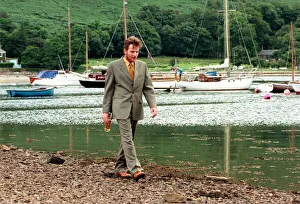 Ewan McGregor on th eIsle of Arran with bottle of Loch Ranza single malt whisky Ewan McGregor on th eIsle of Arran with bottle of Loch Ranza single malt whisky