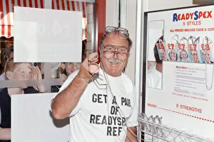 Images Dated 1st August 1990: Ex footballer Jimmy Greaves at the worlds first spectacle vending machine